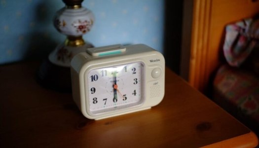 Put your alarm clock farther than hand-length to get up early